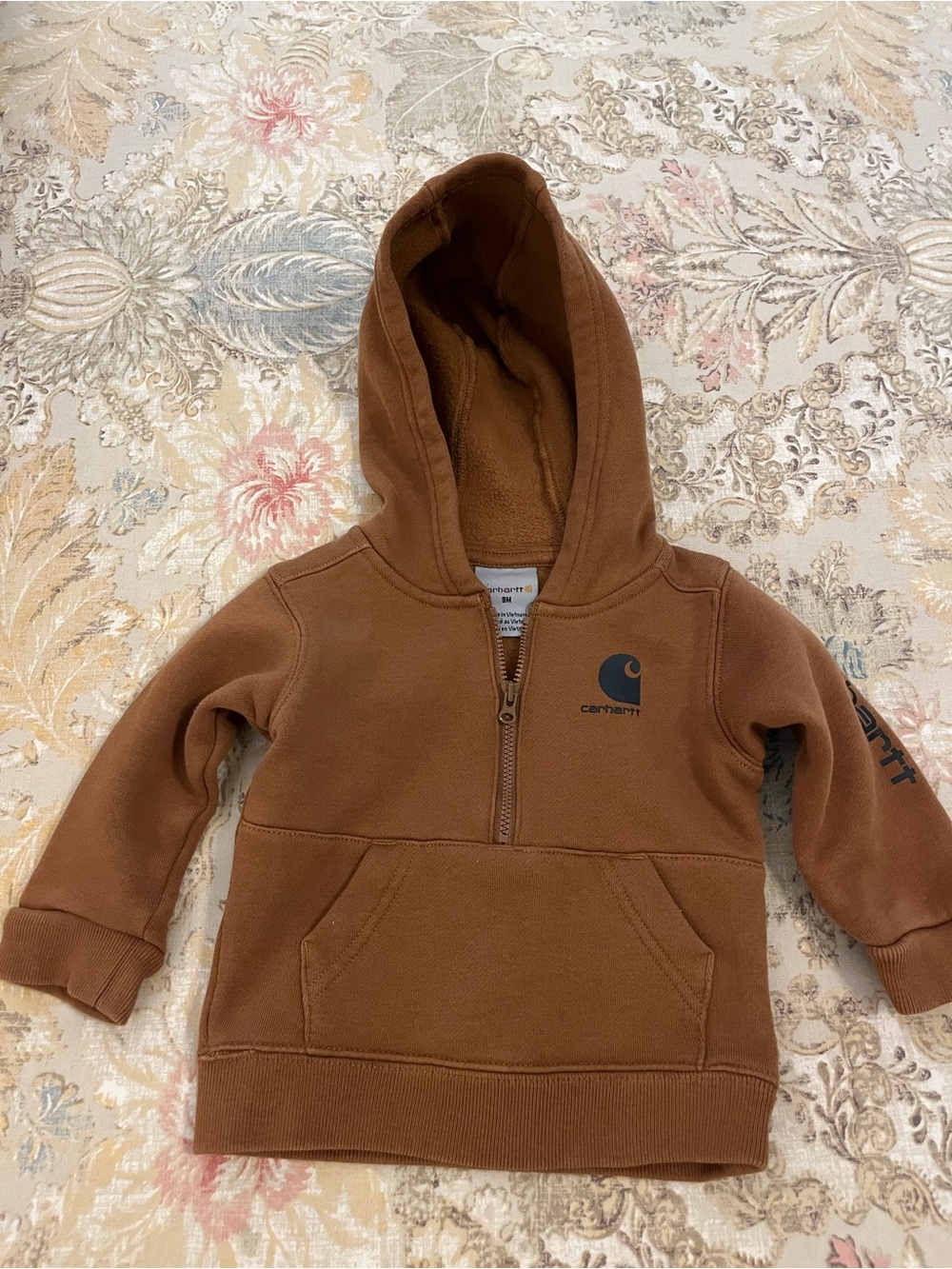 Carhartt 9 Months Boys Brown 1/2 Zip Hoodie with Front Pockets.